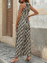 Tied Printed Grecian Neck Jumpsuit - Diverse Creations & CompanyTied Printed Grecian Neck JumpsuitCream