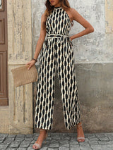 Tied Printed Grecian Neck Jumpsuit - Diverse Creations & CompanyTied Printed Grecian Neck JumpsuitCream