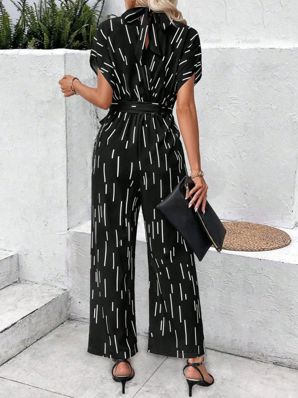 Tied Printed Mock Neck Wide Leg Jumpsuit - Diverse Creations & CompanyTied Printed Mock Neck Wide Leg JumpsuitBlack